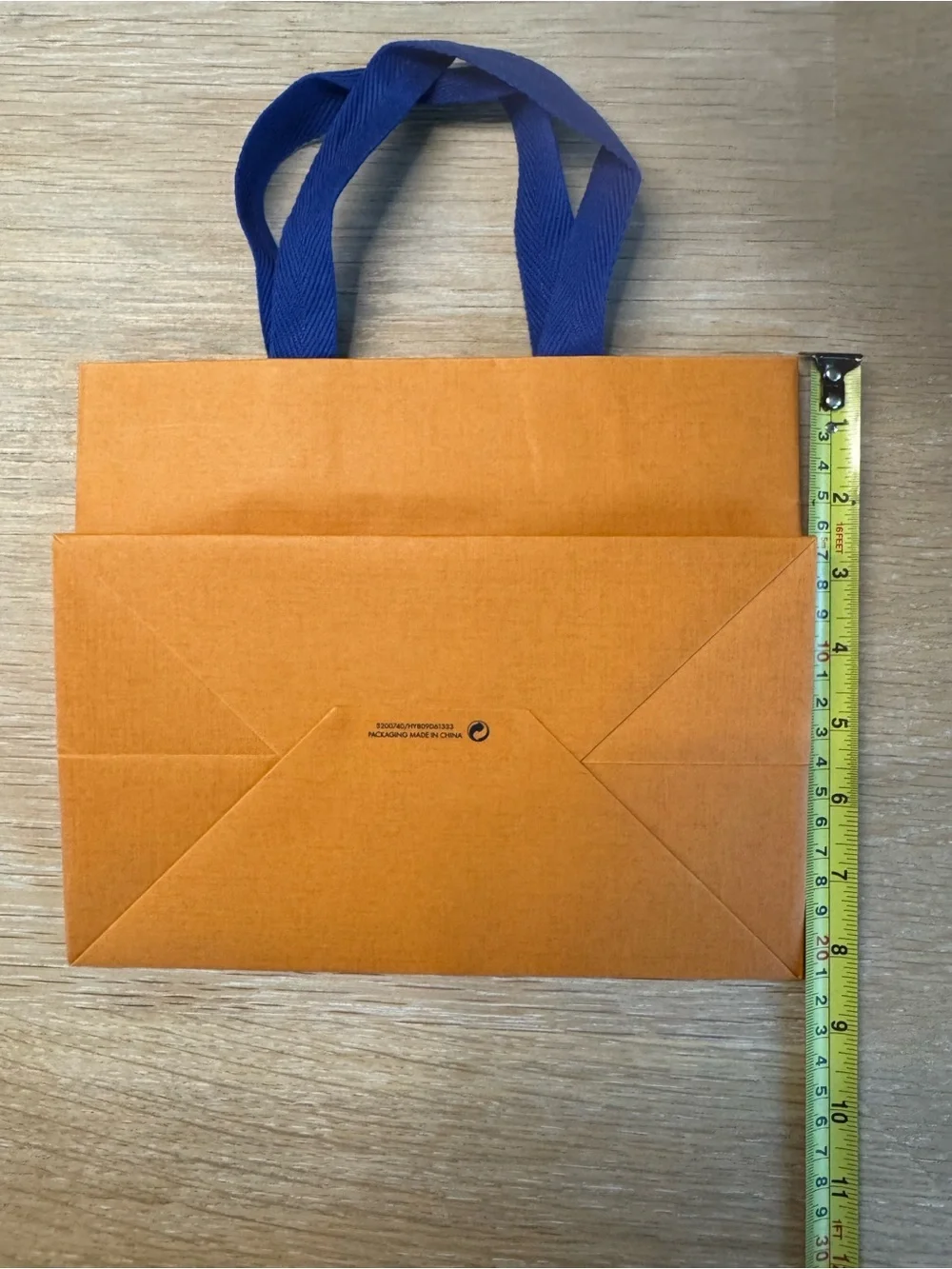 an authentic Louis Vuitton paper shopping bag